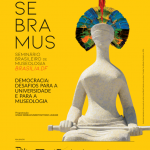 Cartaz contendo estátua da Justiça com cocar indígena nas cores preta, salmão, azul, vermelho e amarelo